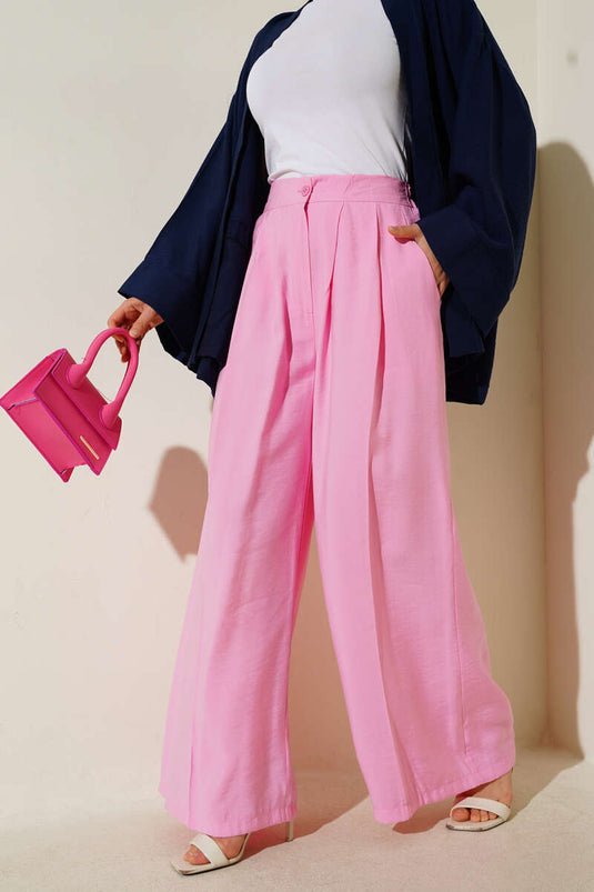 بنطال كاجوال بأزرار وردية اللون