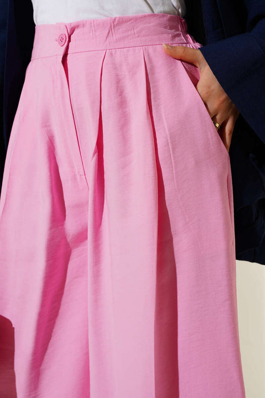 بنطال كاجوال بأزرار وردية اللون