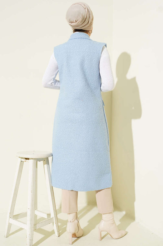 Gilet long en bouclé à boutons bleu bébé