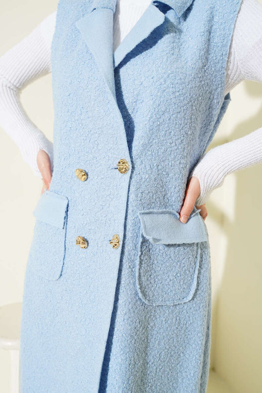 Gilet long en bouclé à boutons bleu bébé