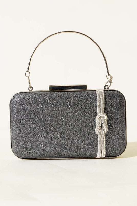 حقيبة سهرة مزينة بعقدة، لون رمادي دخاني