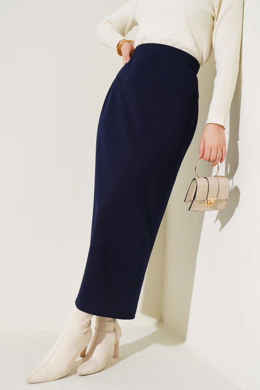 تنورة قلم رصاص بلون أزرق داكن سادة