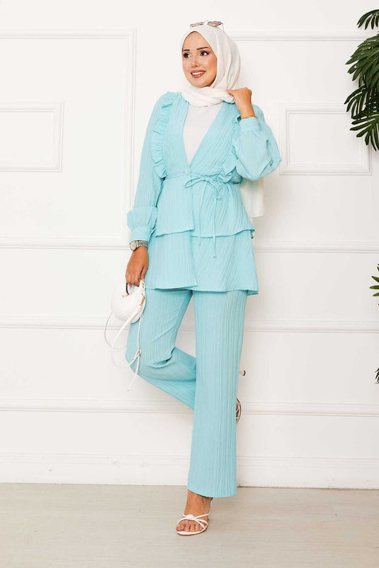 Costume deux pièces avec volants et détails volantés sur la jupe, vert mer