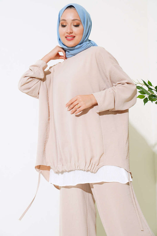 Costume triple beige avec ourlet élastique