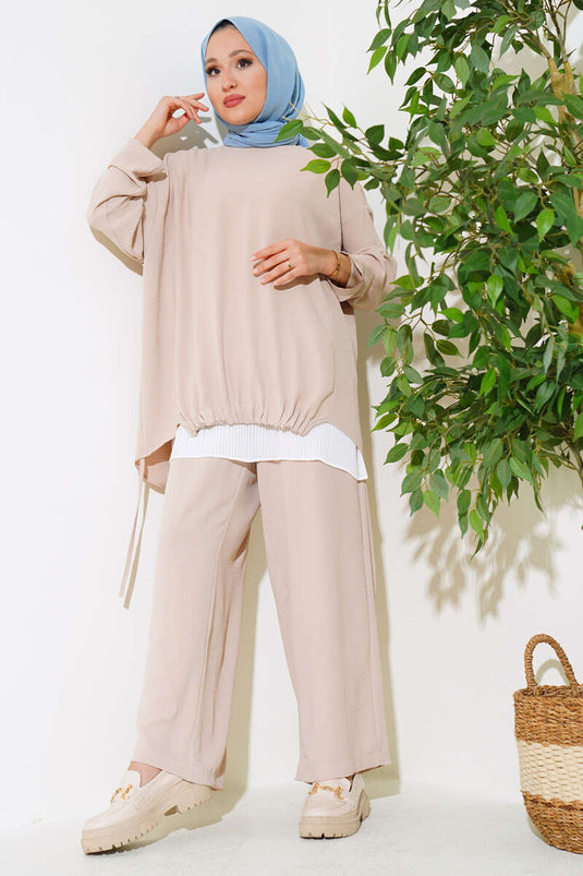 Costume triple beige avec ourlet élastique