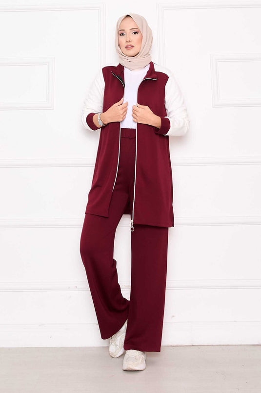 بدلة رياضية مكونة من قطعتين بسحاب ومزينة باللون الأحمر الداكن