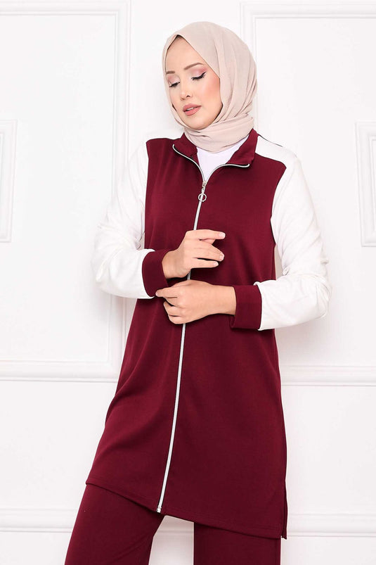 بدلة رياضية مكونة من قطعتين بسحاب ومزينة باللون الأحمر الداكن