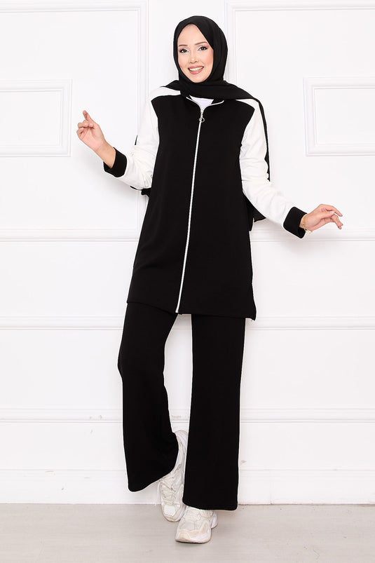 Combinaison de sport deux pièces zippée et garnie noire