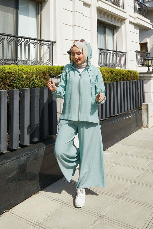 Ensemble deux pièces à capuche avec fermeture éclair et détails menthe