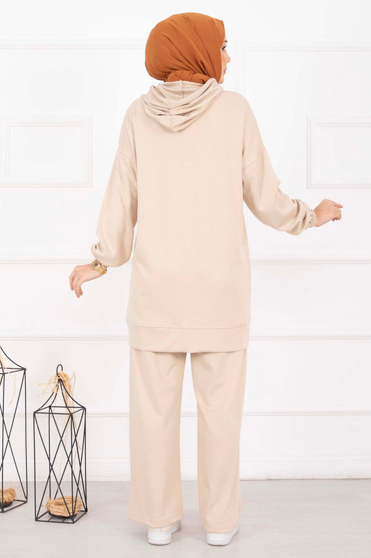 Completo coprente con cappuccio e collo con cerniera beige