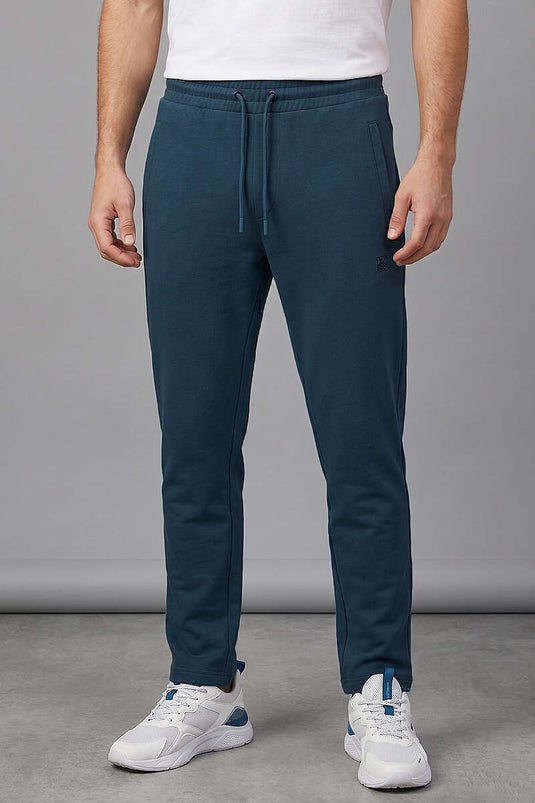 Pantalon de survêtement homme avec poches zippées, couleur pétrole