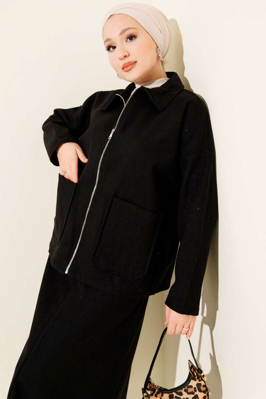 Ensemble deux pièces noir avec poches zippées et jupe en cachemire