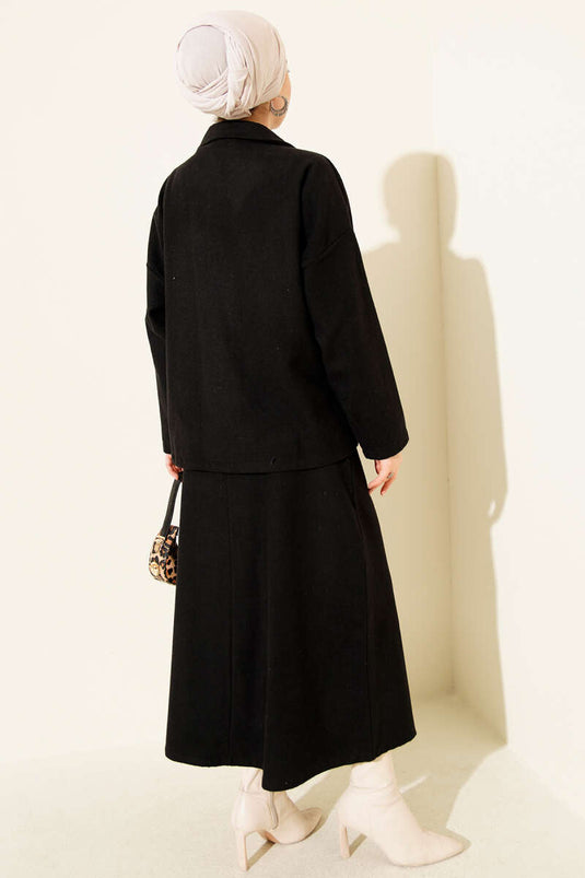 Ensemble deux pièces noir avec poches zippées et jupe en cachemire