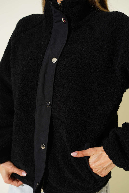 Veste en peluche noire avec fermeture éclair et boutons-pression
