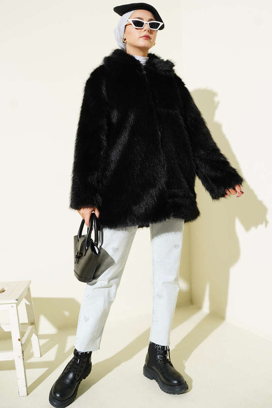 Manteau de fourrure noir à col de chemise zippé