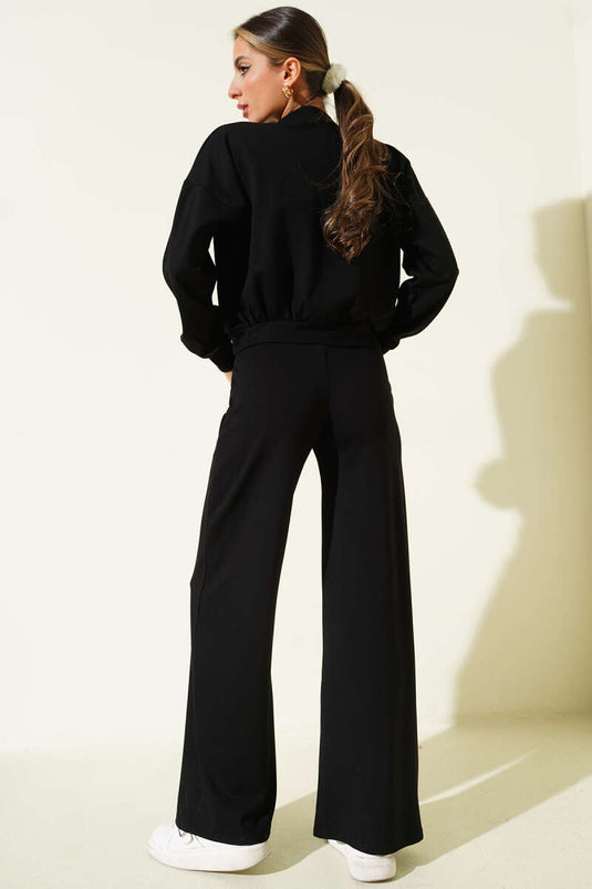 طقم ثنائي بسوستة وسترة قصيرة سوداء