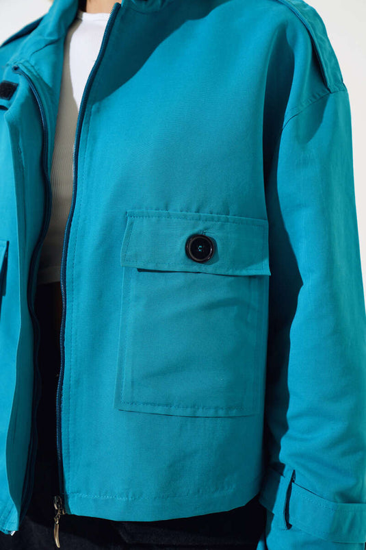 Veste courte à épaulettes zippées, vert pétrole