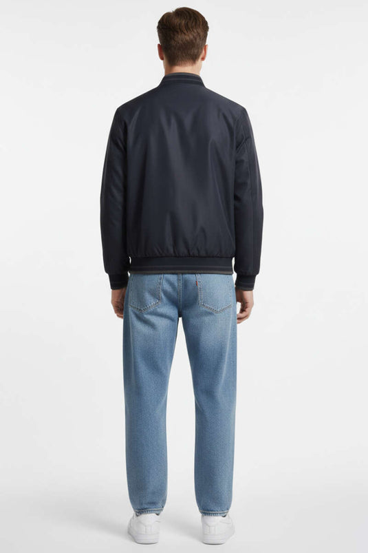 معطف رجالي موسمي بأزرار سحاب وتفاصيل مضلعة باللون الأزرق الداكن