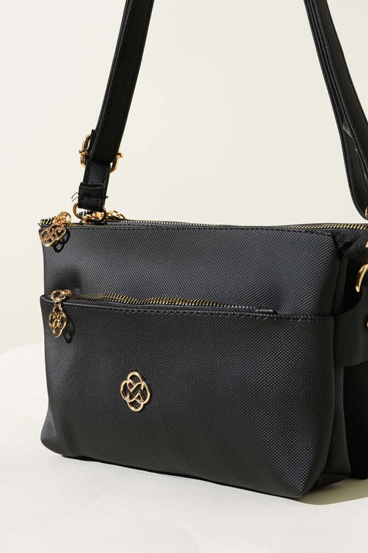 Sac noir à trois compartiments zippé