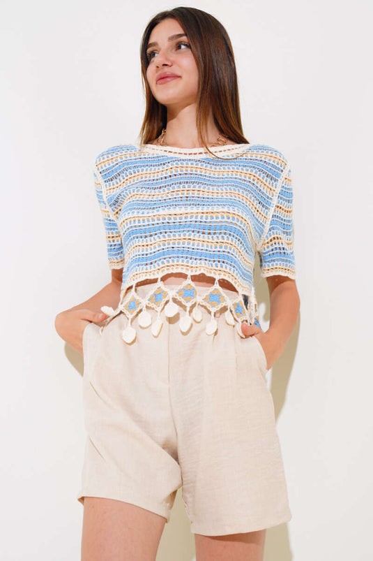 Blaue Bluse aus Netzspitze