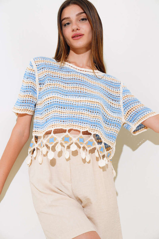 Blaue Bluse aus Netzspitze