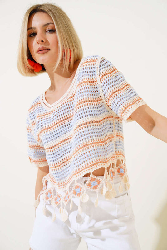 Orangefarbene Spitzenbluse