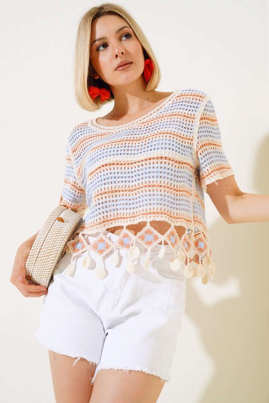 Orangefarbene Spitzenbluse