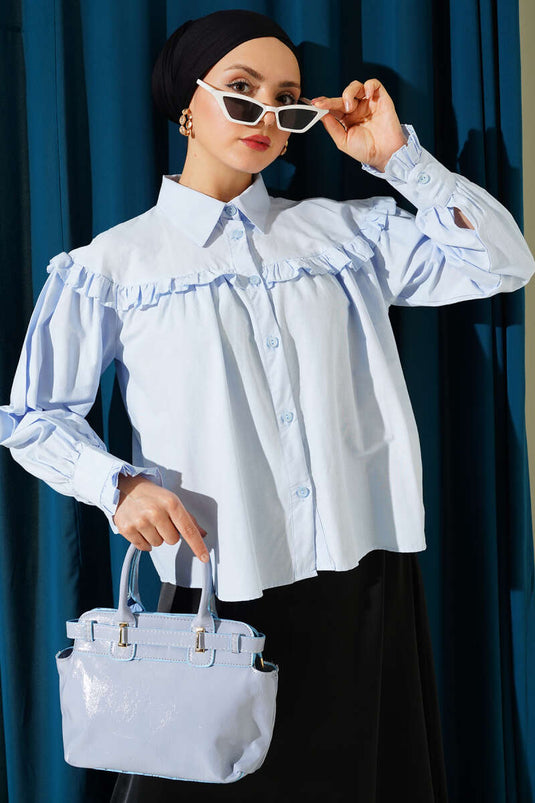 Chemisette courte à volants bleu bébé