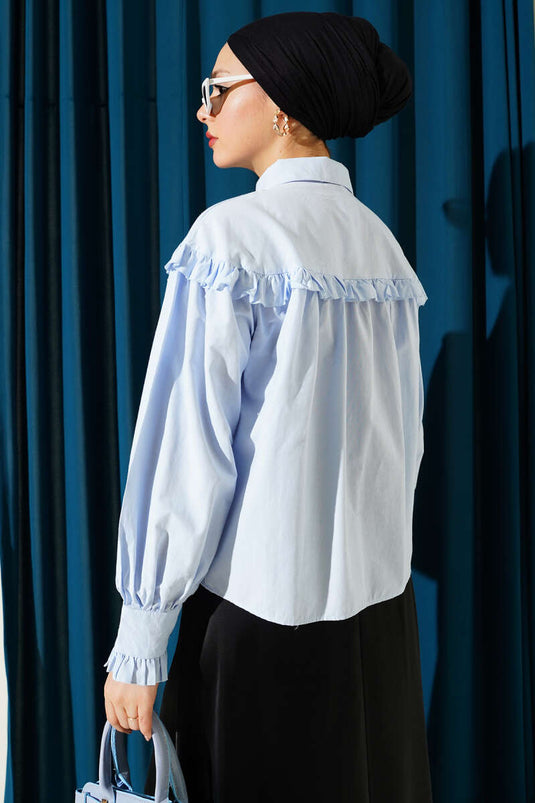 Chemisette courte à volants bleu bébé