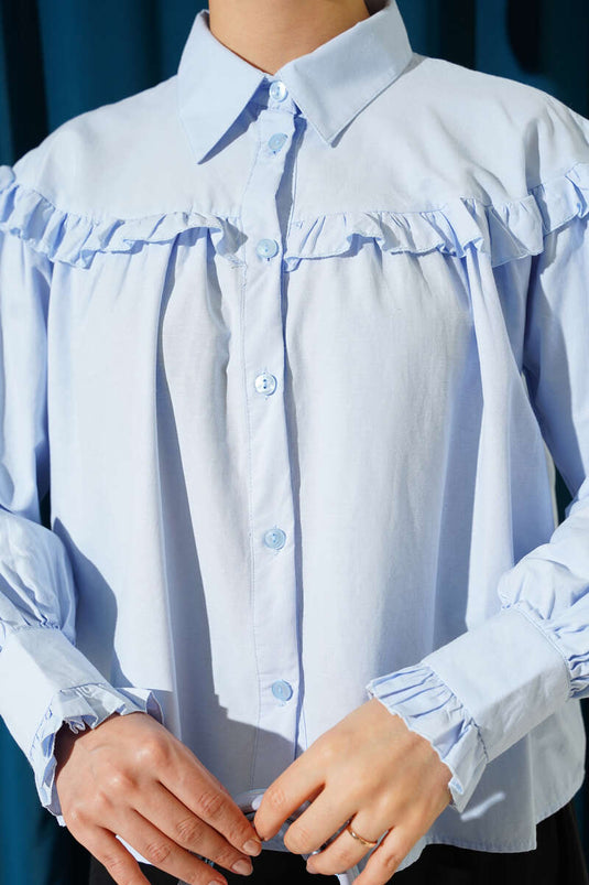 Chemisette courte à volants bleu bébé