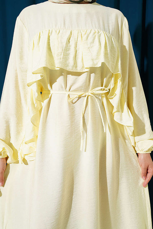 Robe jaune avec ceinture à cordon et bandes à volants