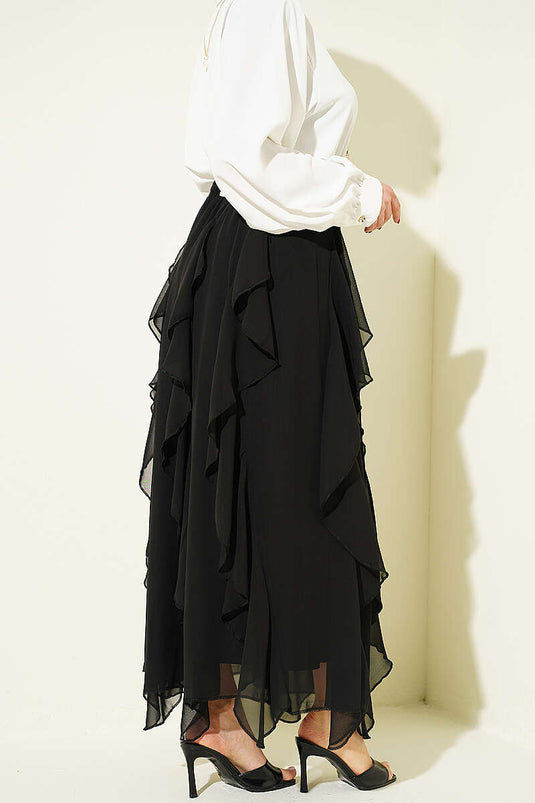 Jupe en chiffon noire à taille élastiquée et volantée
