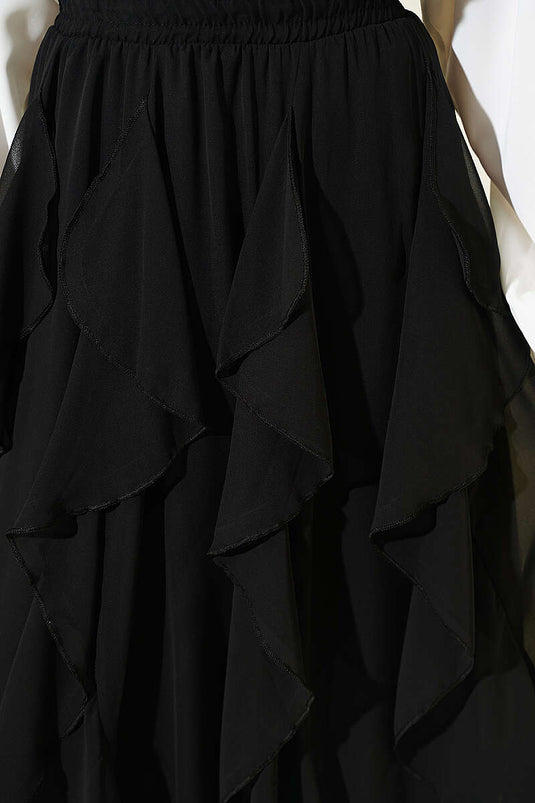 Jupe en chiffon noire à taille élastiquée et volantée