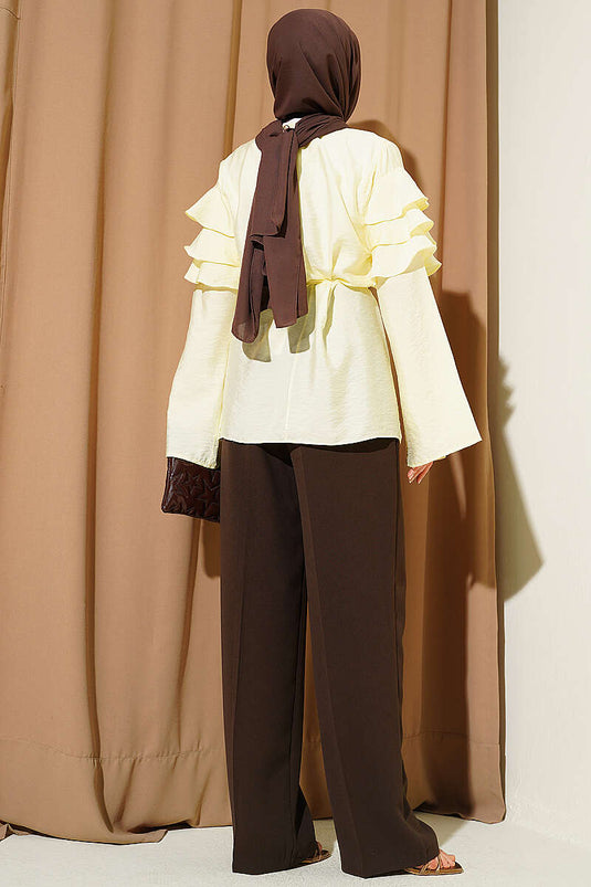 Tunique jaune à ceinture cordelette et volants