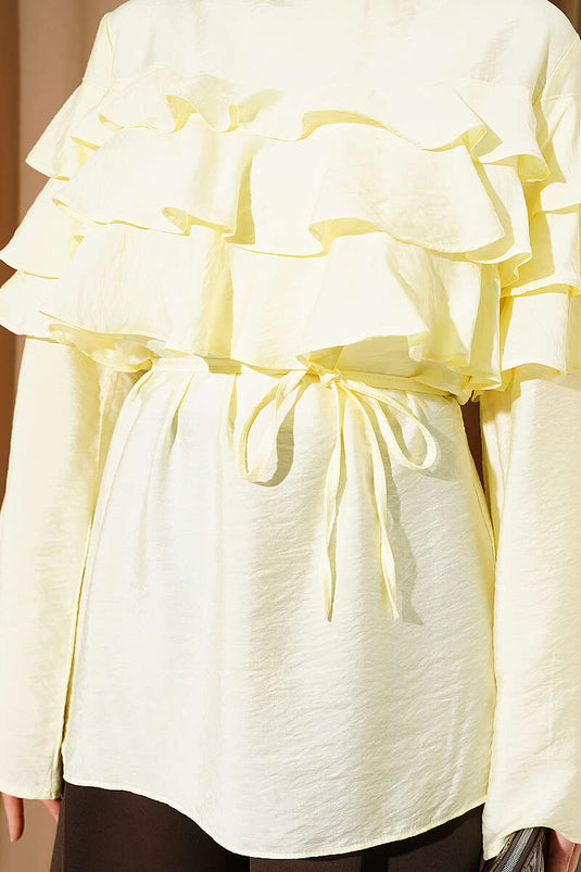 Tunique jaune à ceinture cordelette et volants