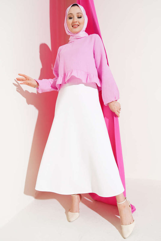 بلوزة كتان بكشكشة وردية