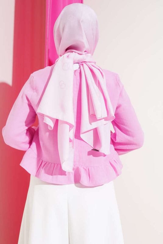 بلوزة كتان بكشكشة وردية