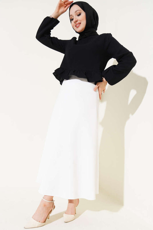 بلوزة كتان مكشكشة باللون الأسود