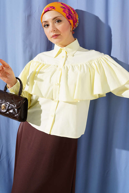 Chemisette courte jaune avec cape volantée détaillée