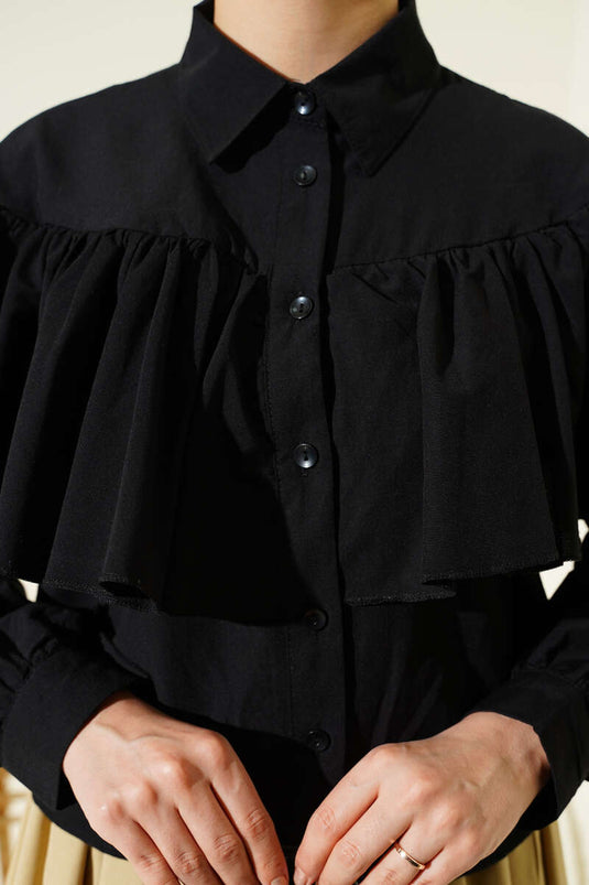 Chemisette courte noire avec cape volantée