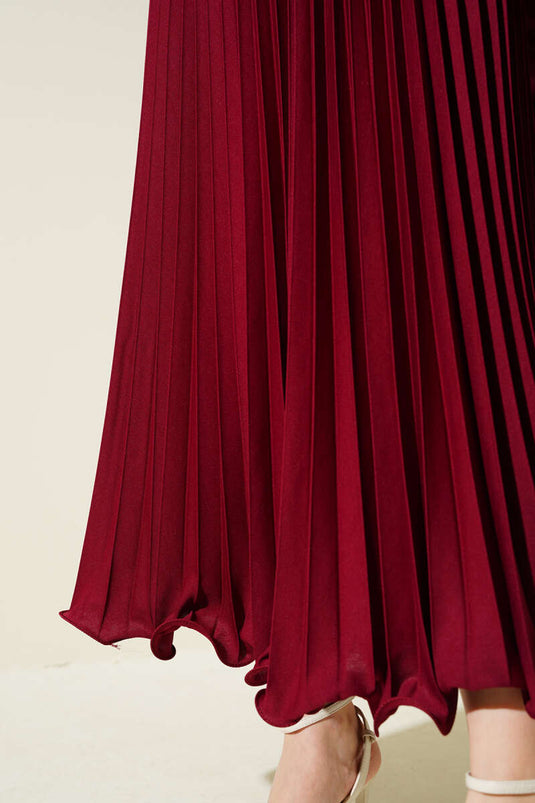 تنورة بخصر مطاطي مطوي ومكشكش باللون العنابي