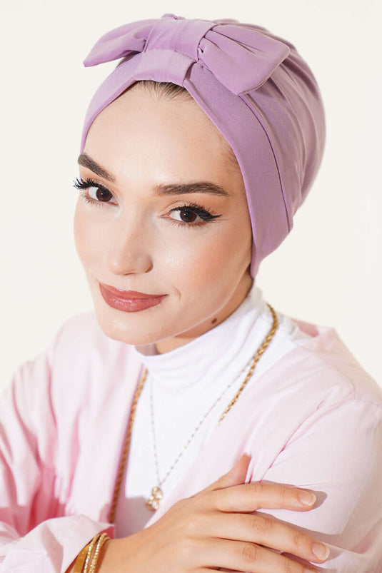 غطاء رأس مزين بفيونكة، لون أرجواني فاتح