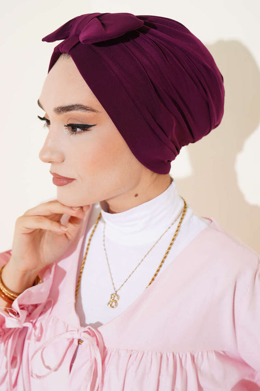 قبعة مزينة بفيونكة، لون البرقوق