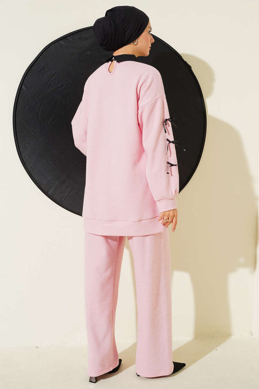 طقم مكون من قطعتين مطبوع عليه فيونكة باللون الوردي