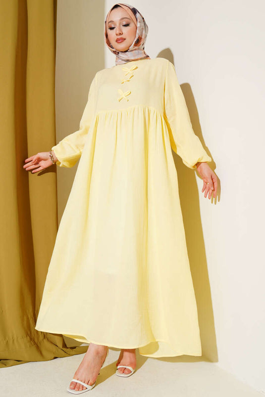 Yellow Muslin Dress with Bow Detail