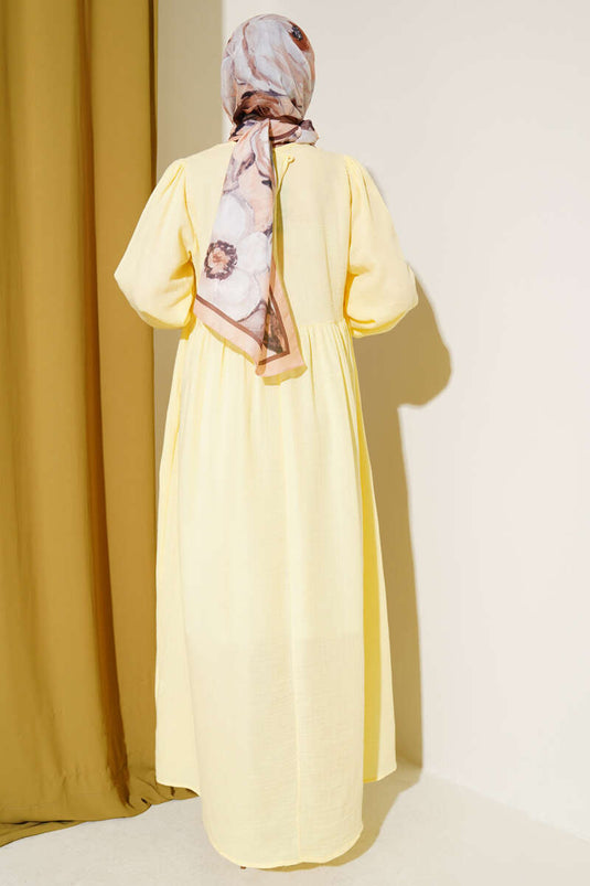 Yellow Muslin Dress with Bow Detail