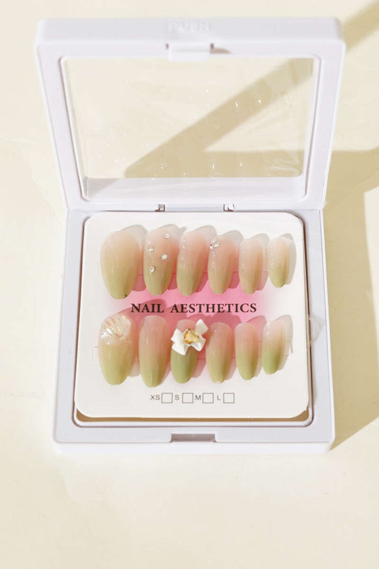 Sortiment 6 künstliche Fingernägel mit Schleifen- und Perlenverzierungen