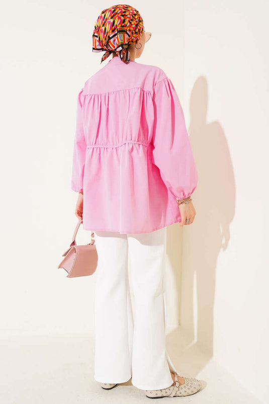 Bluse mit Schleife und Raffungen in Rosa