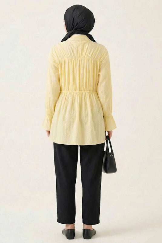 Chemisier jaune à manches élastiquées avec nœud