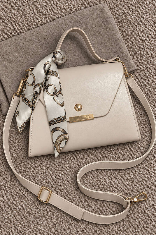 Kremfarbige Quadertasche Mit Schalldetails
